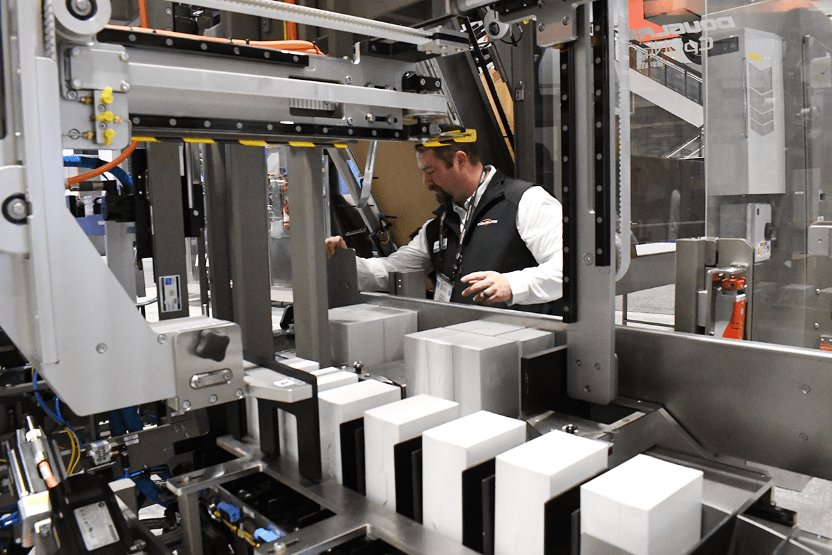 Man running packaging equipment