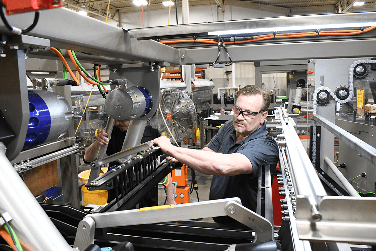 Douglas Service Technician working on machine