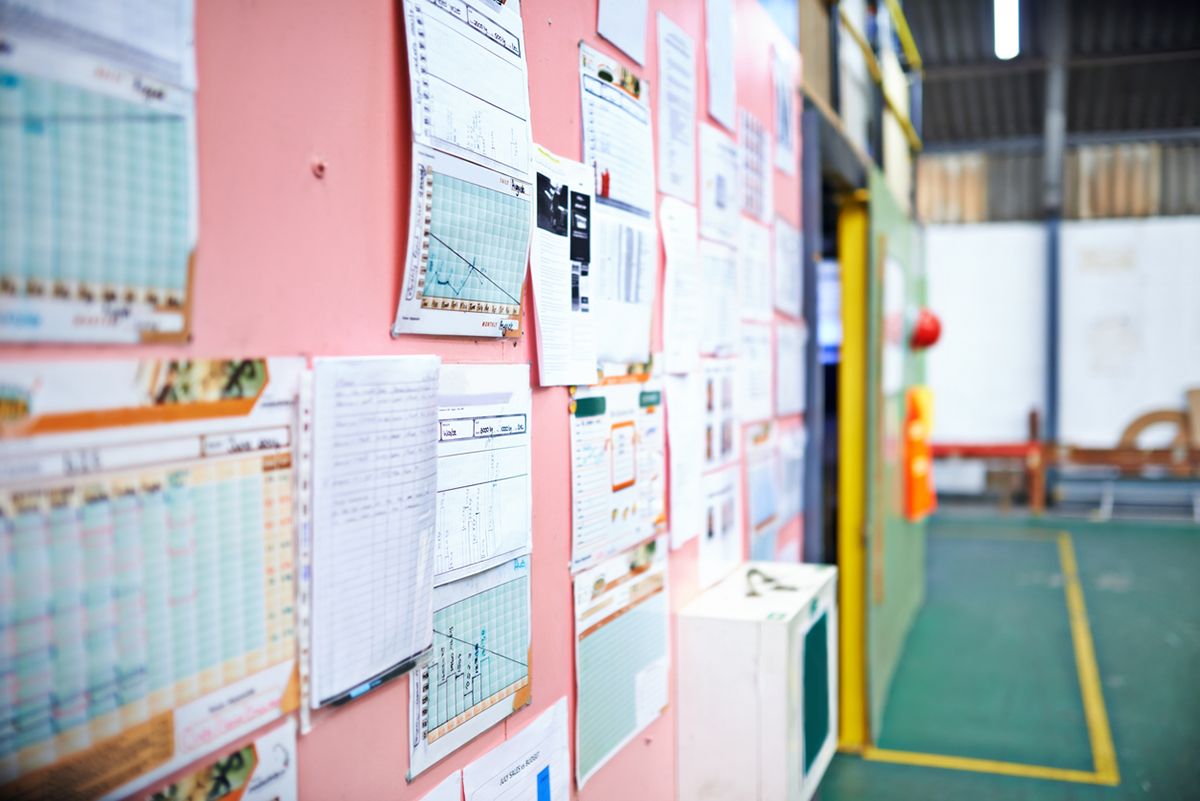 Colorful charts and documents on wall