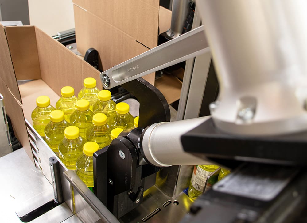 Tech working on packaging machine